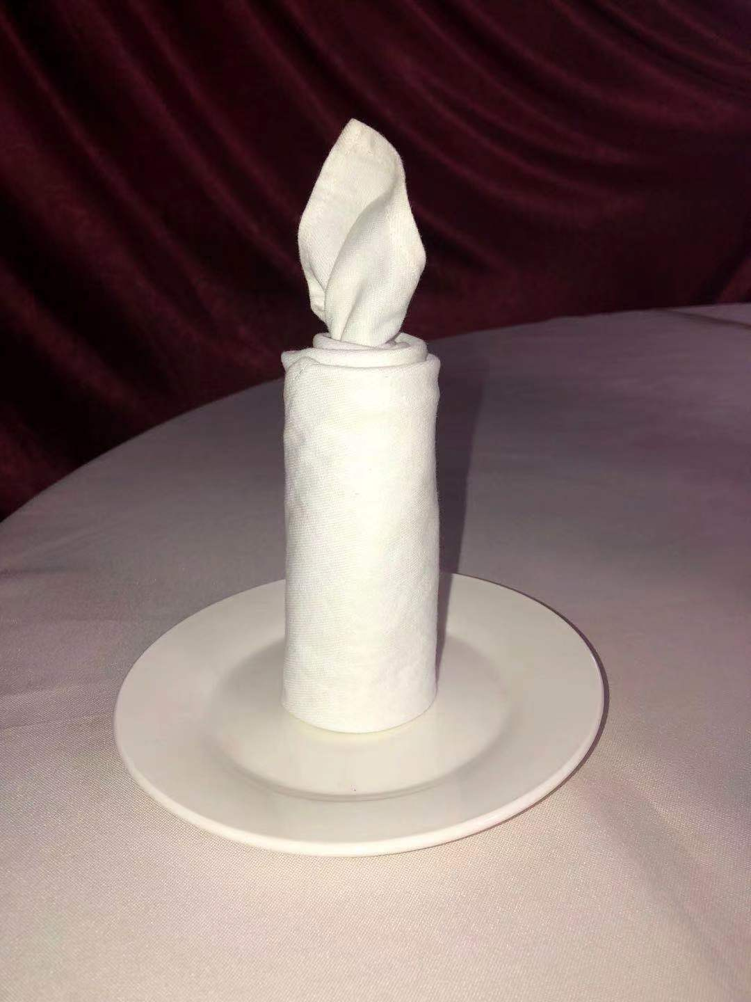 我校教育旅游部举行第二届妙手生花餐巾折花技能比赛